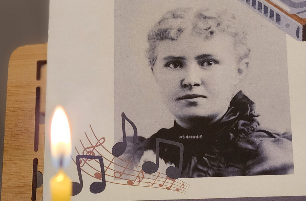 A black and white family history photo with a candle in the foreground.